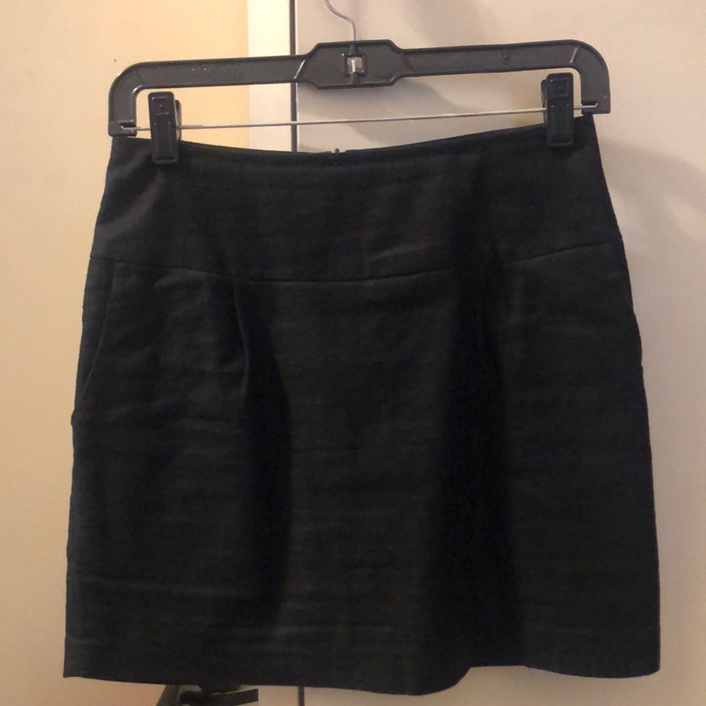 Cute textured black mini skirt.